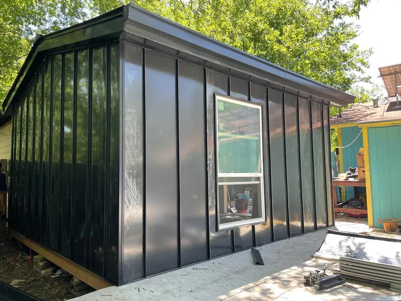 Black standing seam metal wall panels for Roof Inspection in Bryant