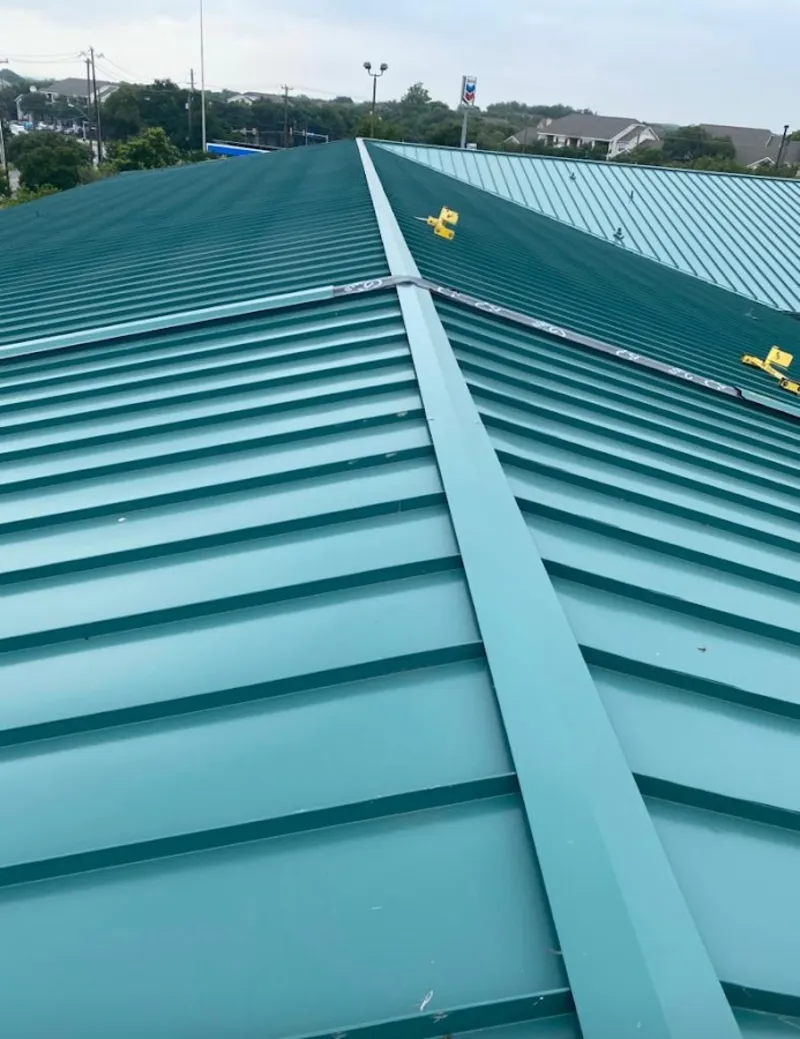 Green commercial metal roof ridge and valley for Metal Roof Repair in Bryant